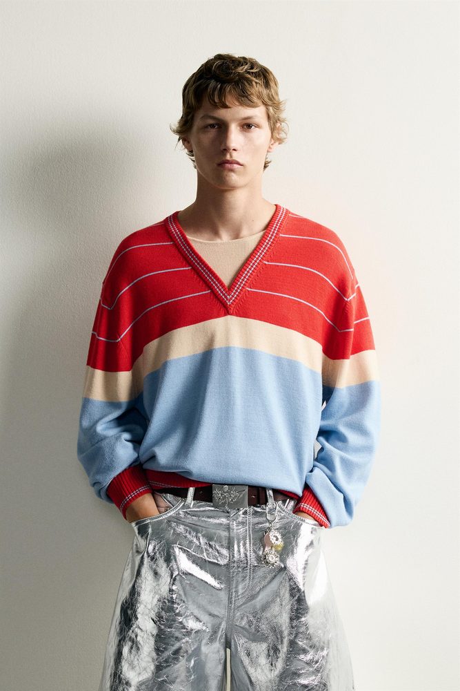 Red and blue striped knit polo, front view.