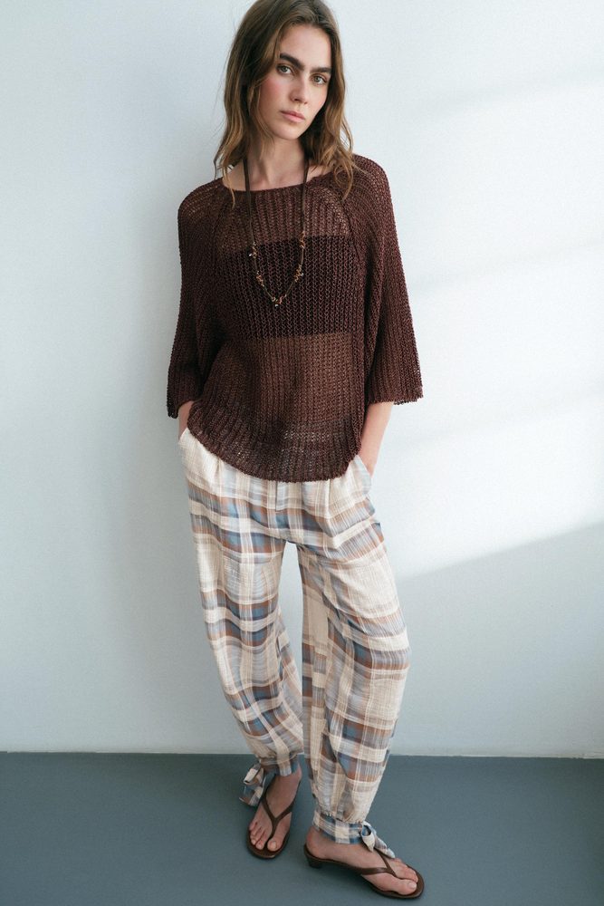 Brown relaxed knitted top, full view.