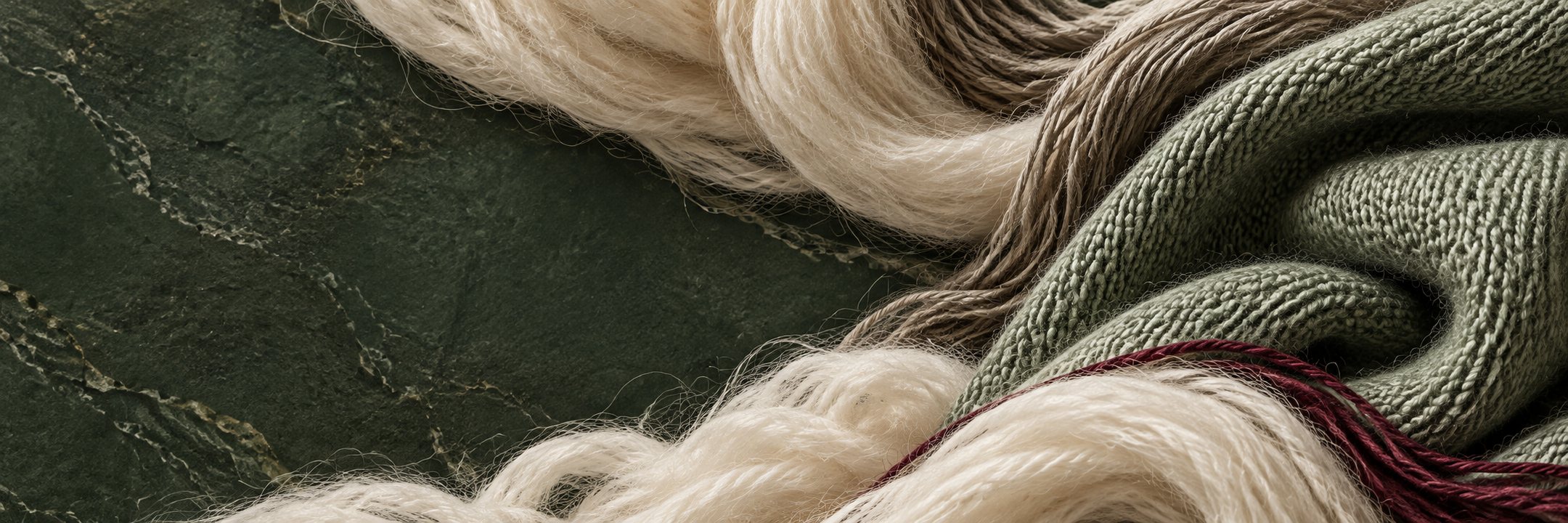 editorial material concept: yarn and knit textures.