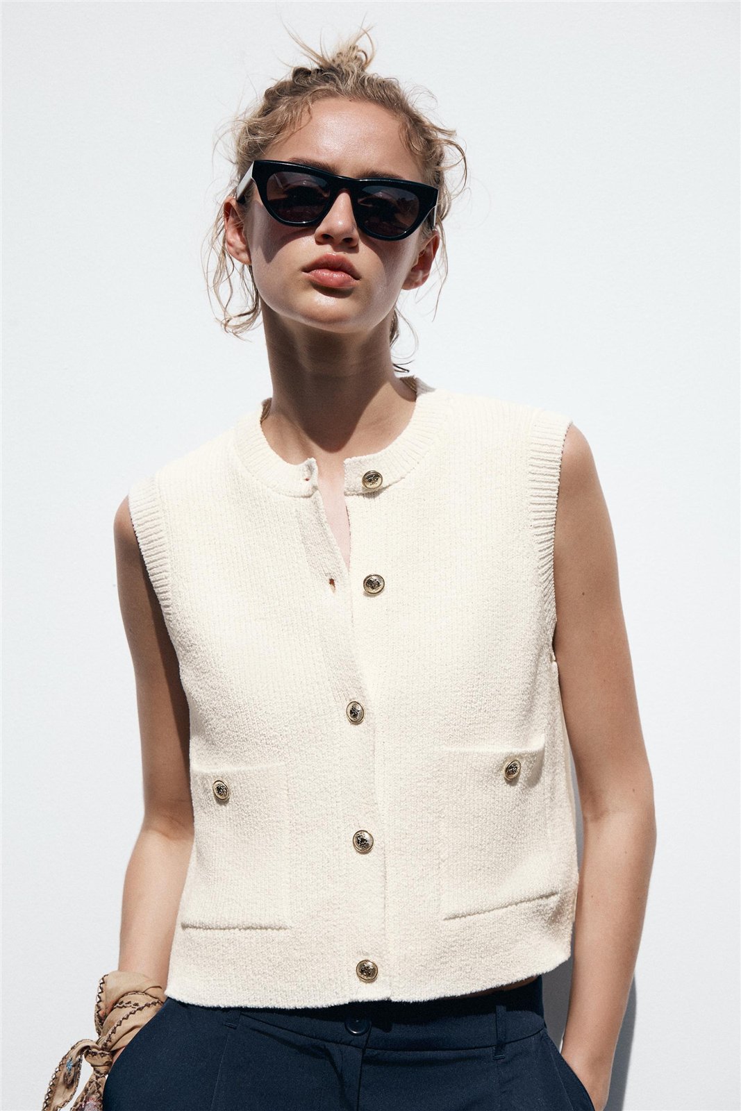 Cream Buttoned Knit Vest — knitwear style reference