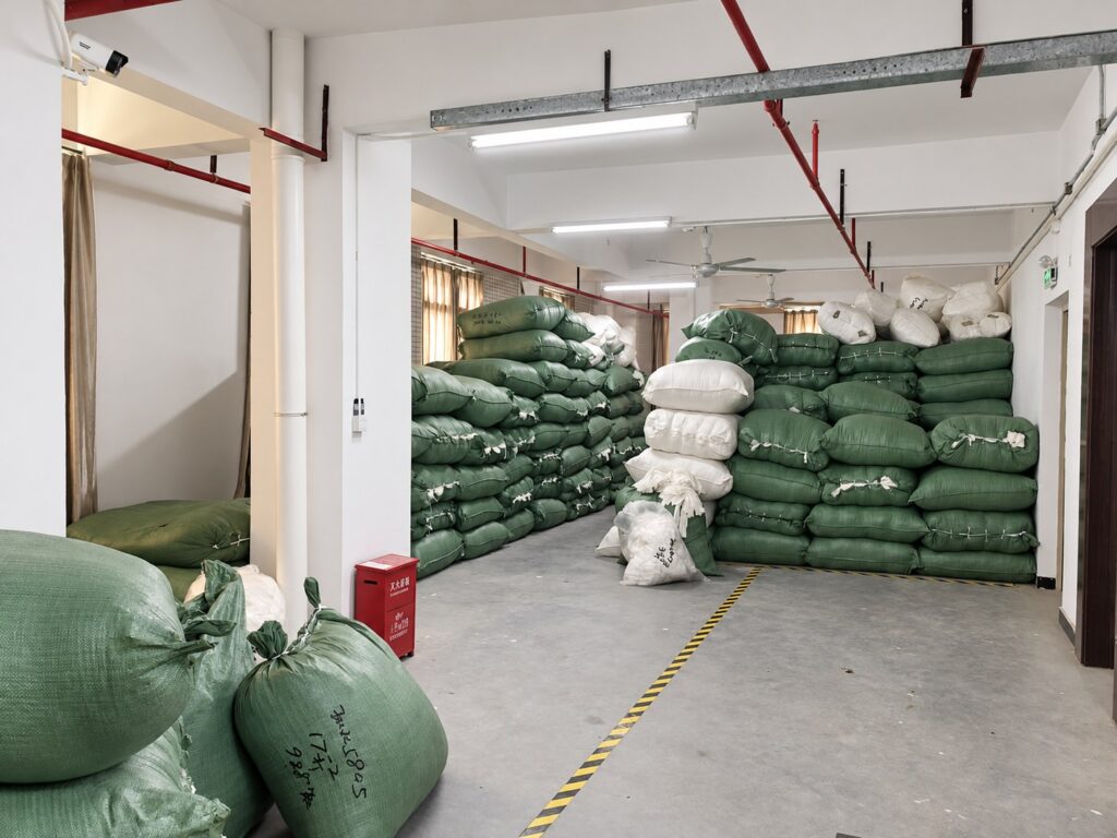 Yarn stock and the marked aisle at the Wayhonk warehouse.